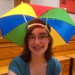 Sarah poses with her umbrella hat
